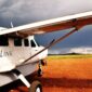 Safarilink Cessna 208 light aircraft at Keekorok Airstrip, Masai Mara